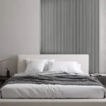 imagine de prezentare riflaj din mdf gri intr.un dormitor pe perete cu un pat de decor